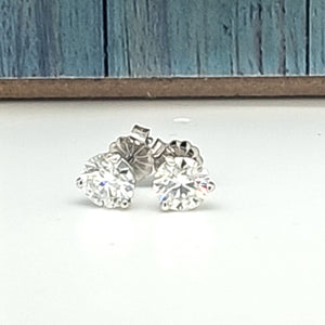 6MM Ideal Cut Moissanite Studs in 14kt 3 prong martini settings